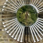 White and Silver clock made from upcycled aviation parts