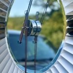 White and Silver clock made from upcycled aviation parts